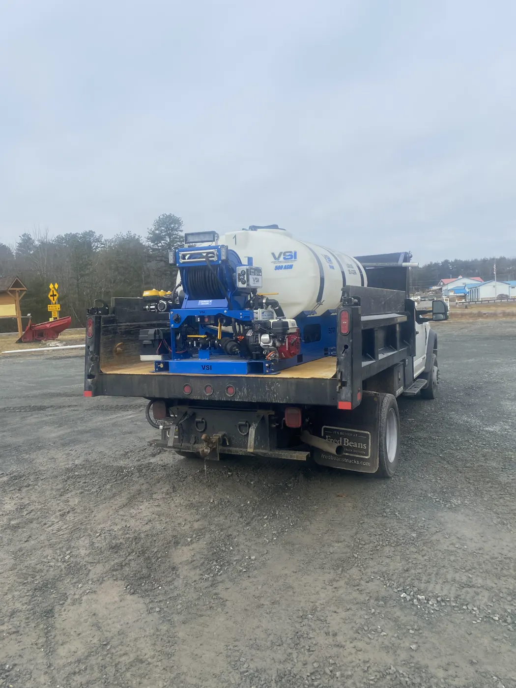 Anthony Winter Services salt truck with spreader on a cleared lot